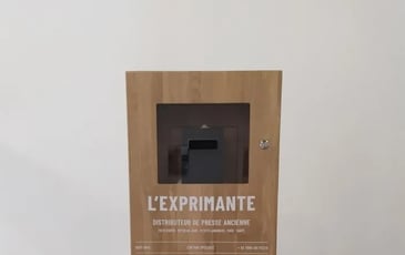 Distributeur de presse ancienne